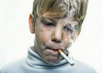 young kid smoking cigarette