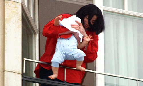 Michael Jackson dangling baby at Hotel Adlon